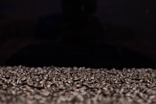 Roasted dark coffee beans background 
