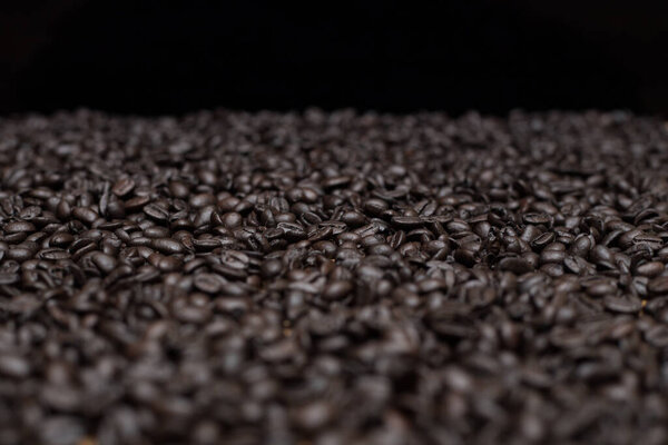 Roasted dark coffee beans background 