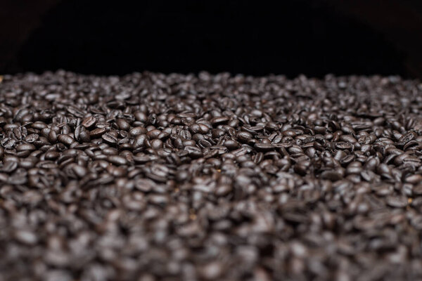 Roasted dark coffee beans background 