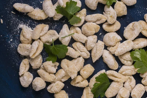 Some Raw Made Gnocchi Basil Blue Table — Stock Photo, Image