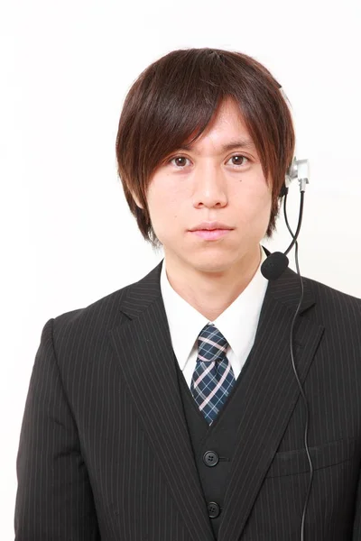 Joven empresario japonés de call center — Foto de Stock