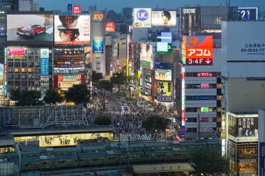 Tokyo, Japan; June 16 2016: Tokyo shibuya crossing crowded with people during dusk