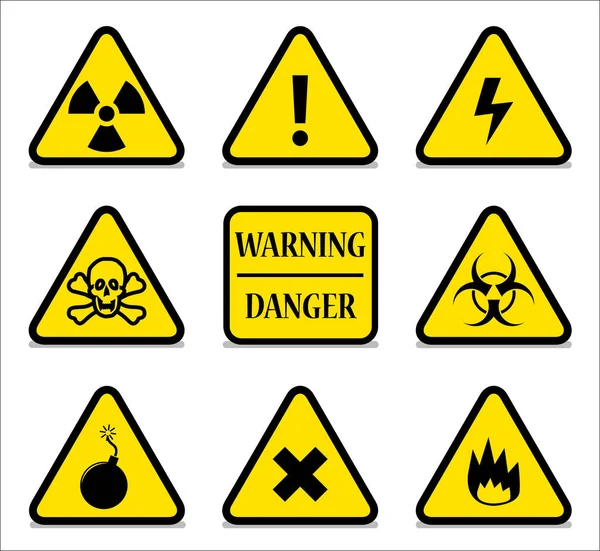 Signes de danger jaune avec ombre — Image vectorielle