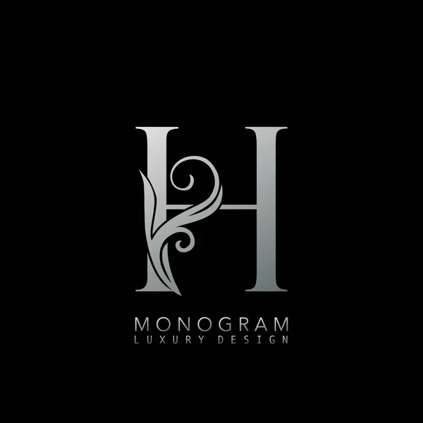 Monogram Luxury H Logo Letter. Simple luxuries vector design concept abstract nature floral leaves with letter logo icon silver color.