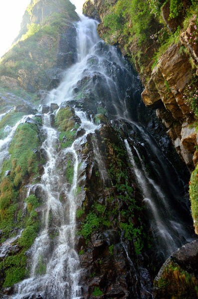 Cascading waterfall in the mountains, Himalayas