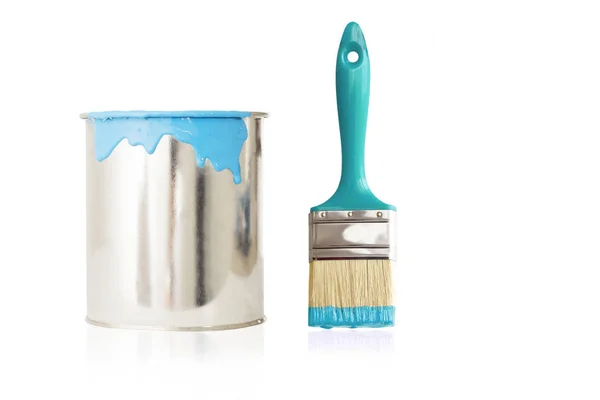 Open, painted bucket and paintbrush on a white backdrop. — Stock Photo, Image