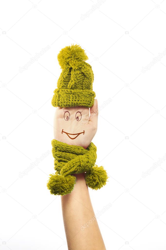 Smiling female hand scarf, hat, white background