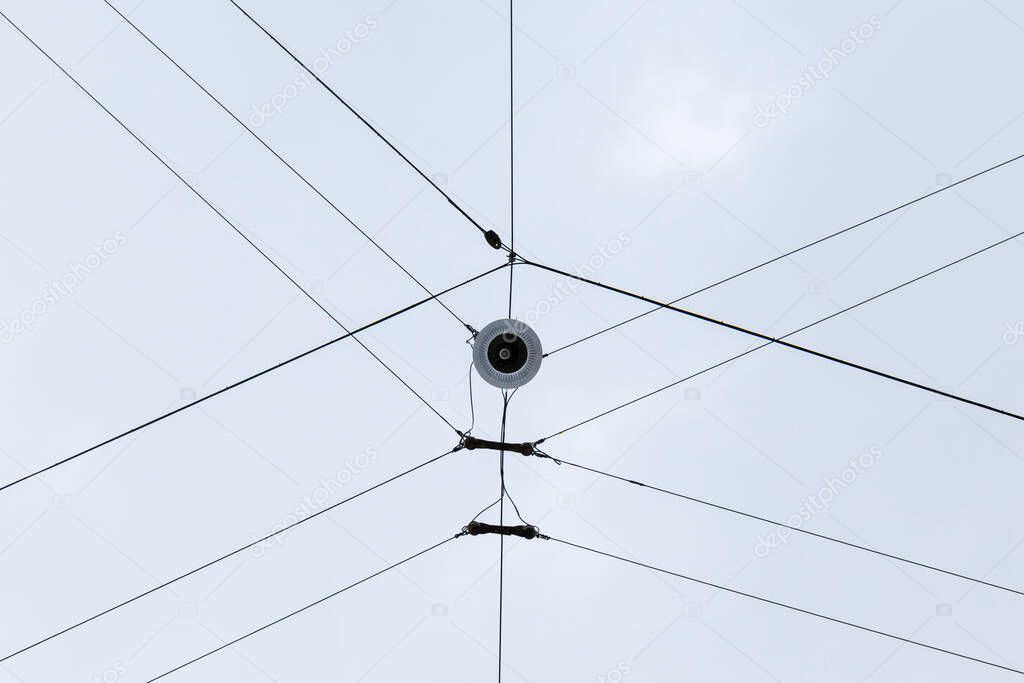 aerial cables of the electrical wiring seen from below, form lines and geometric shapes