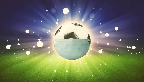 ユーロサッカーキャンセルイベントのコンセプト コロナウイルスマスク付きボール — ストック写真