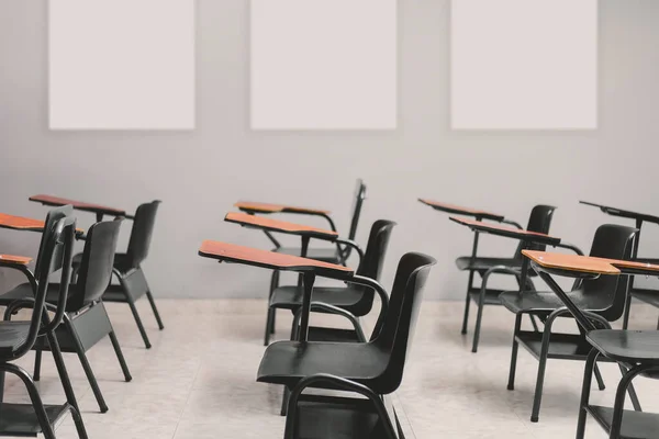 close-up of empty desks in classroom, concept social distancing