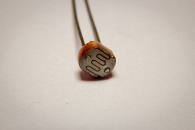 Photo resistor used for detecting light intensity clipart
