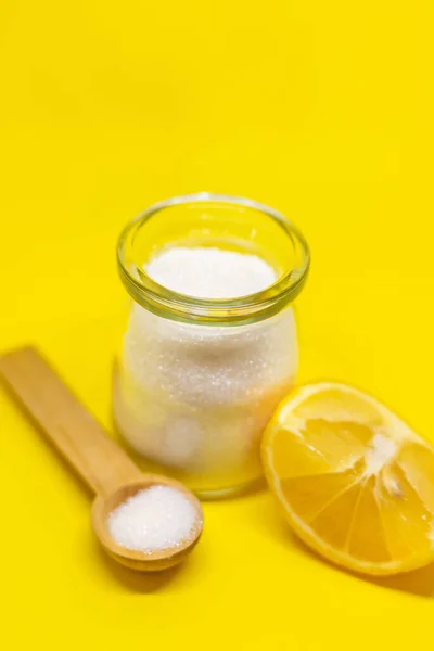 Citric acid on a yellow background. Selective focus.