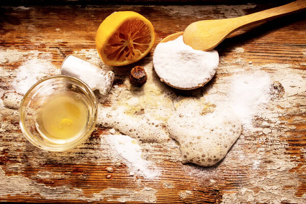 soda and lemon on a wooden background. Selective focus