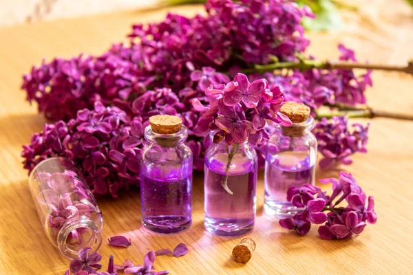 lilac oil in small bottles. selective focus