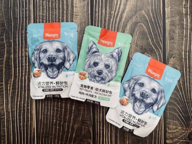 Shanghai/China - February 25, 2020: Wanpy Wet Dog Food Chinese and English packaging.  Global Yantai Pet Food manufacturer based in Shandong , China.