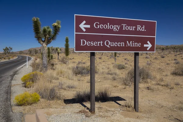 Sign post on Park Boulevard for Desert Queen Mine and Geology Tour Road, Joshua Tree National Park, California, USA