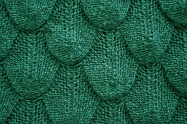 Gerçekçi örgü dokusu yeşile yakın. Moda konsepti.