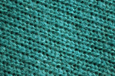 Örülmüş doku, koyu mavi ve maviye boyanmış.