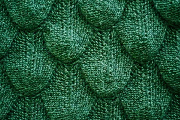 Realistic knitted texture closeup in green. Модная концепция . — стоковое фото