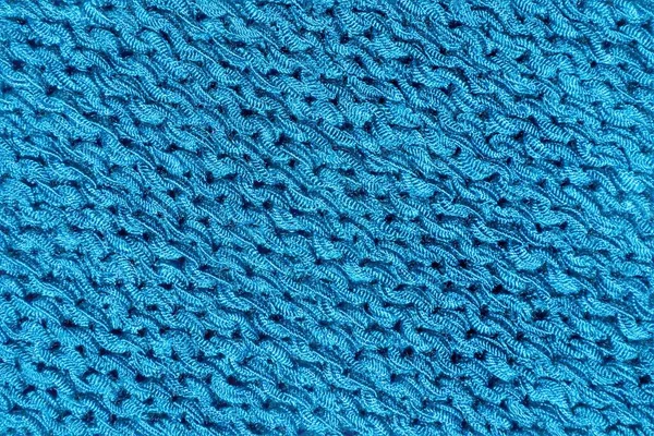 Knitted texture saturated dark blue. — Stock Photo, Image