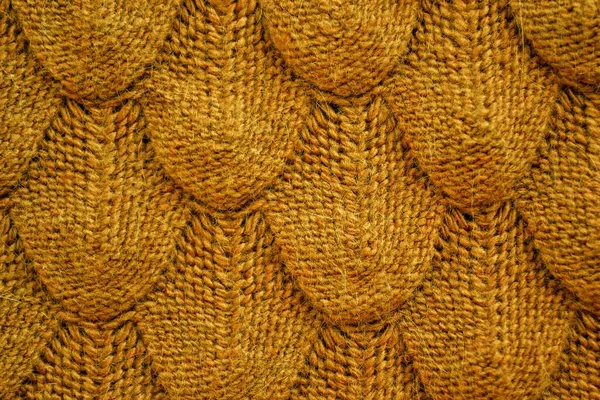 Realistické pletená textura detailní up v oranžové hnědé. Módní koncept. — Stock fotografie