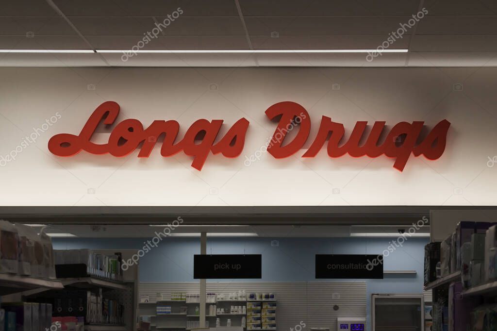 Honolulu, Hawaii - April 16, 2020: Longs Drugs sign and pharmacy counter in the Ala Moana Target department store in Honolulu.