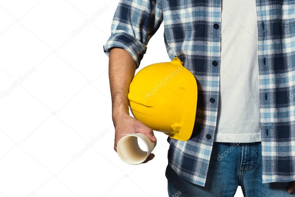engineer holding yellow helmet for workers security