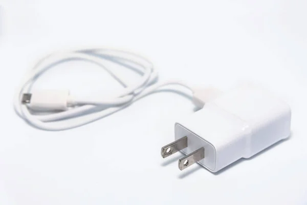 Carregador Adaptador com cabo USB isolado no fundo branco — Fotografia de Stock