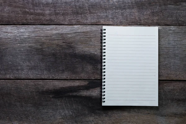 Note book on wood table — Stock Photo, Image