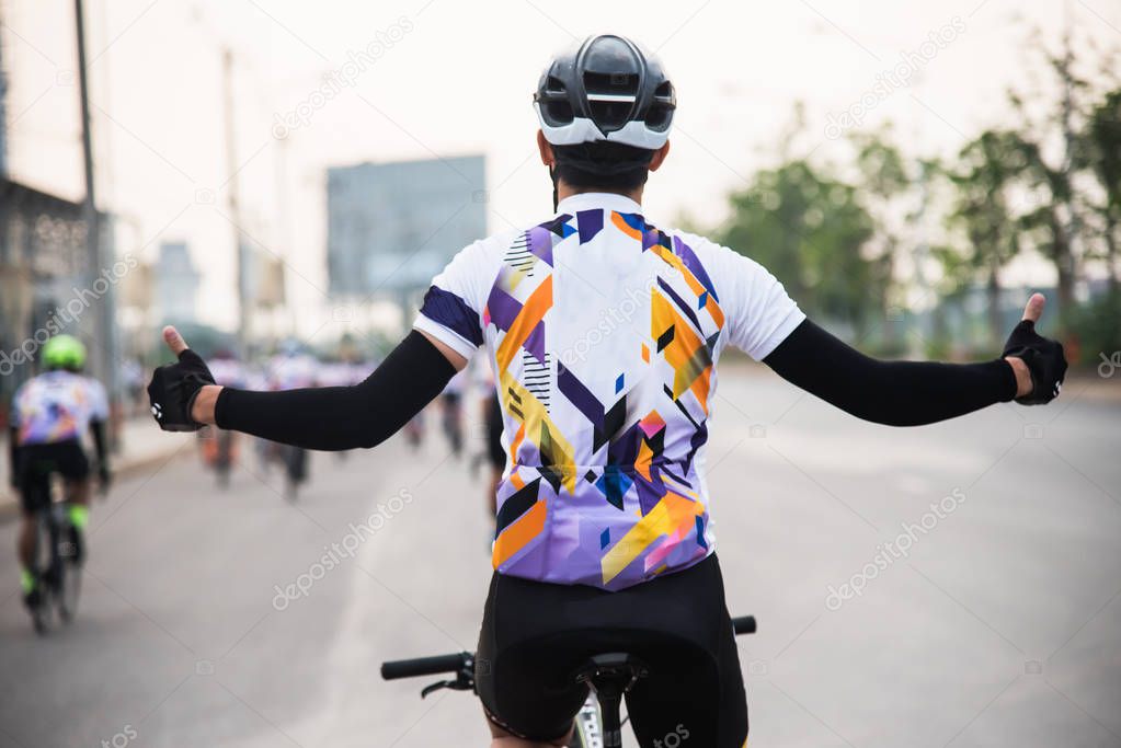 Man riding bicycle on the road