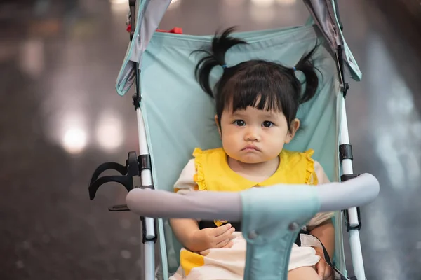 Portrait of cute baby sitting on the chair — Stock Photo, Image