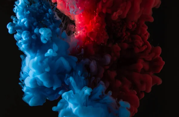 Explosion of paint mixing under water