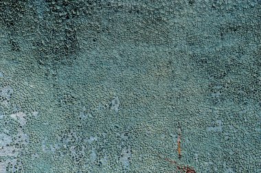 Kurumuş mavi boyayla kaplanmış eski bir yüzeyin dokusu