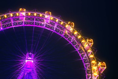 Lighting Ferris wheel in the night - Vienna Prater / Wiener Riesenrad in Austria