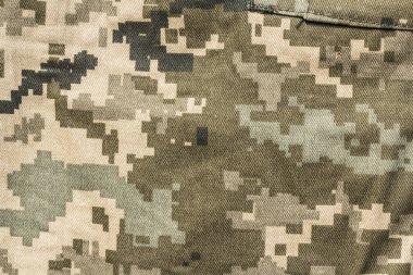 Closeup of military uniform surface. clipart