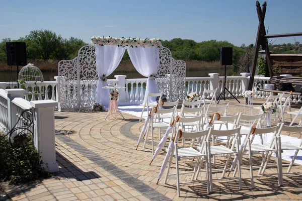 Wedding arch, visiting ceremony on the river bank