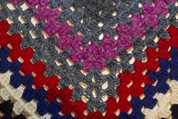 Handmade colored knitted rug pattern