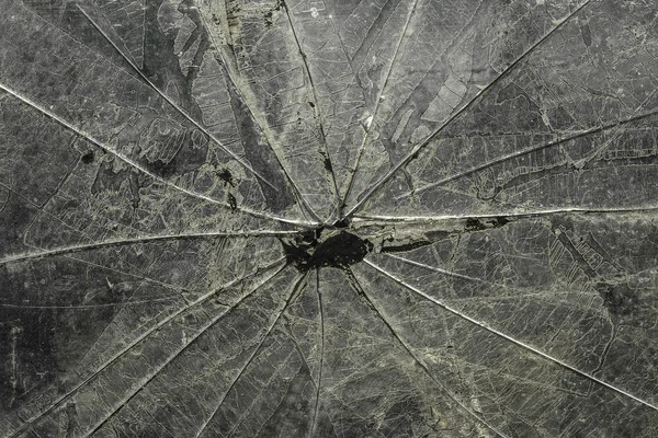 Cam dokusu, çatlak, toz ve çizikler, yakın plan.