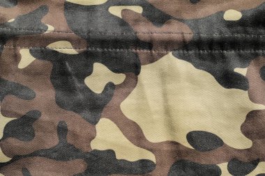 Kamuflaj arka plan dokusu, askeri üniforma yüzeyini kapatın.