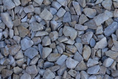 Taş deniz kıyısı, arka plan, doku. Bir bayrak olarak kullanılabilir.