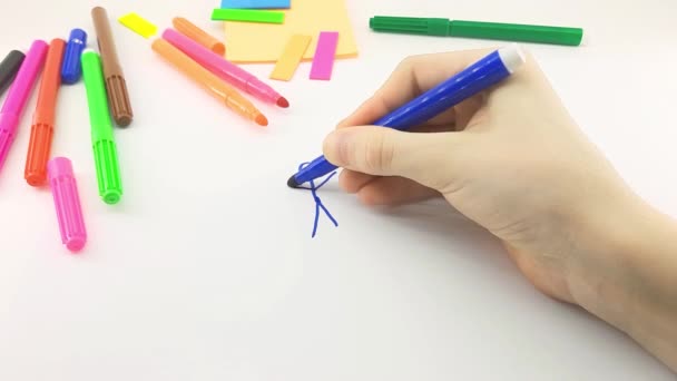 Child Draws Little Men White Sheet — Stock Video