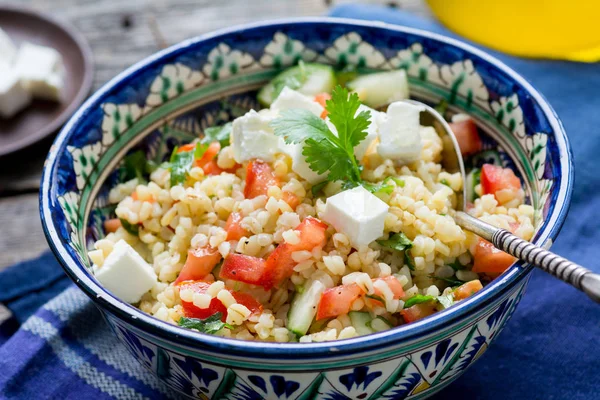 Close up view of healthy salad with bulgur and cheese — Stock Photo, Image