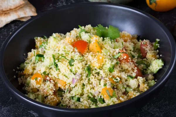 Couscous tabbouleh salad in bowl — Stock Photo, Image
