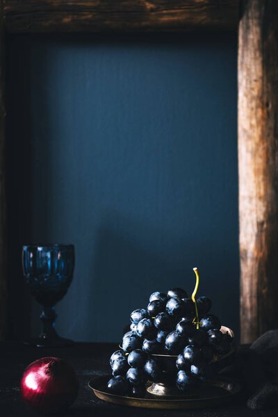 Still life of black grapes