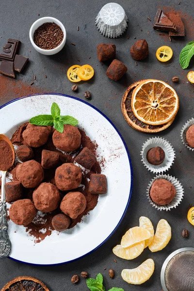 Dark chocolate truffle with orange peel — Stock Photo, Image