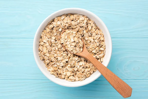 Rolled oats, oat flakes in bowl