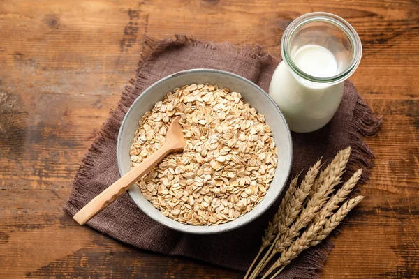Dry oat flakes, oatmeal, rolled oats — ストック写真