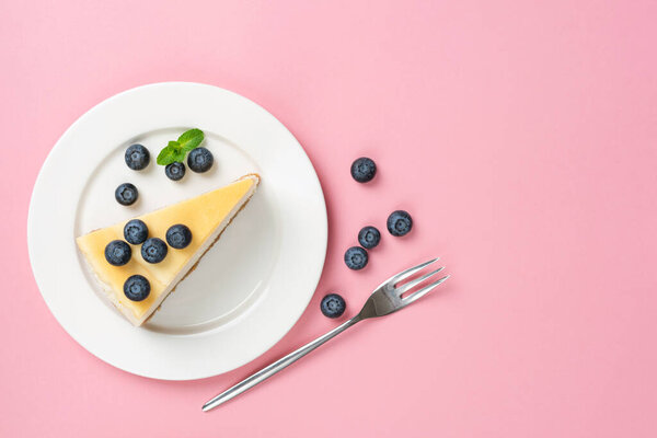 Cheesecake Slice On Pink Background