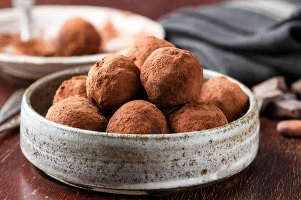 Chocolate truffles on plate — Stock Photo, Image