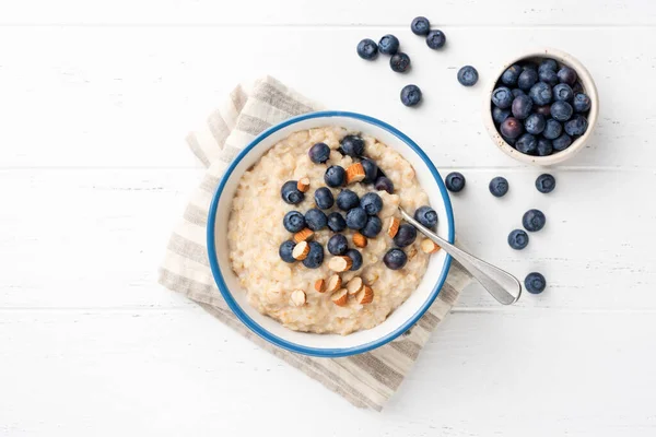 Oatmeal Porridge With Blueberries, Almonds In Bowl — Stock Photo, Image